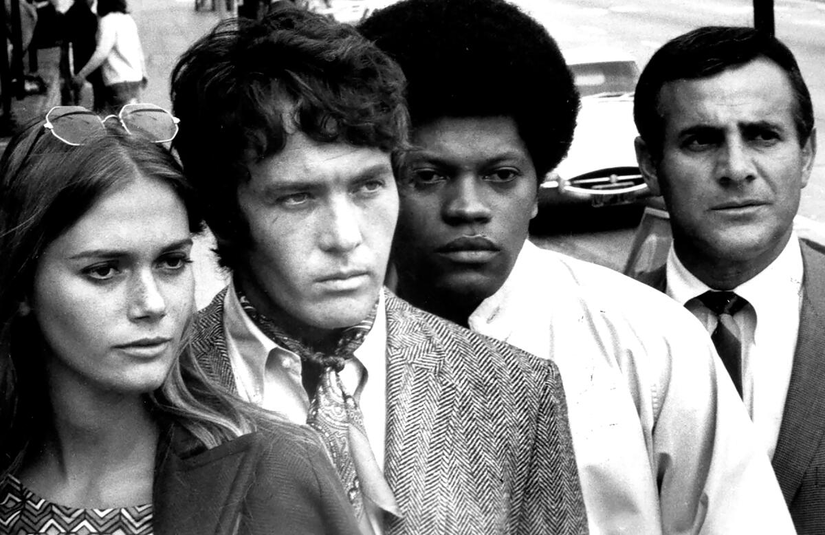 Peggy Lipton, Michael Cole, Clarence Williams III and Tige Andrews in a scene from the 1960s TV series "The Mod Squad."