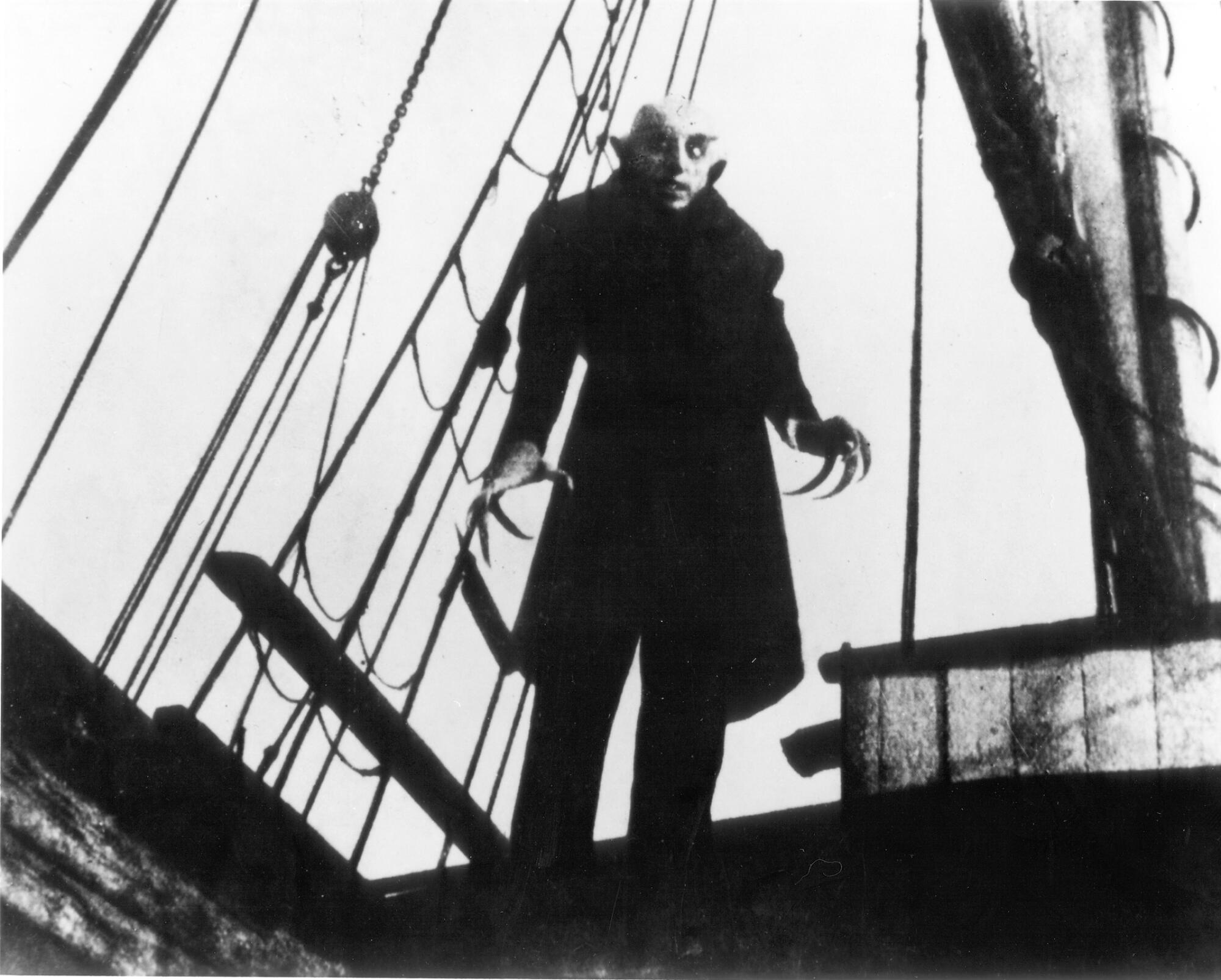 An otherwordly looking human figure in F.W. Murnau's black-and-white "Nosferatu."