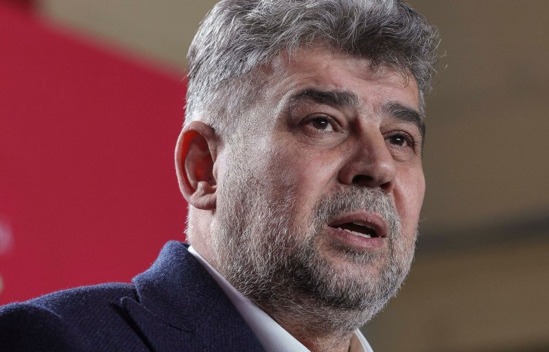 Prime Minister Marcel Ciolacu, leader of the Social Democracy Party, delivers a speech at the PSD campaign headquarters after the first exit poll for parliamentary elections was announced on Sunday. Photo by EPA-EFE