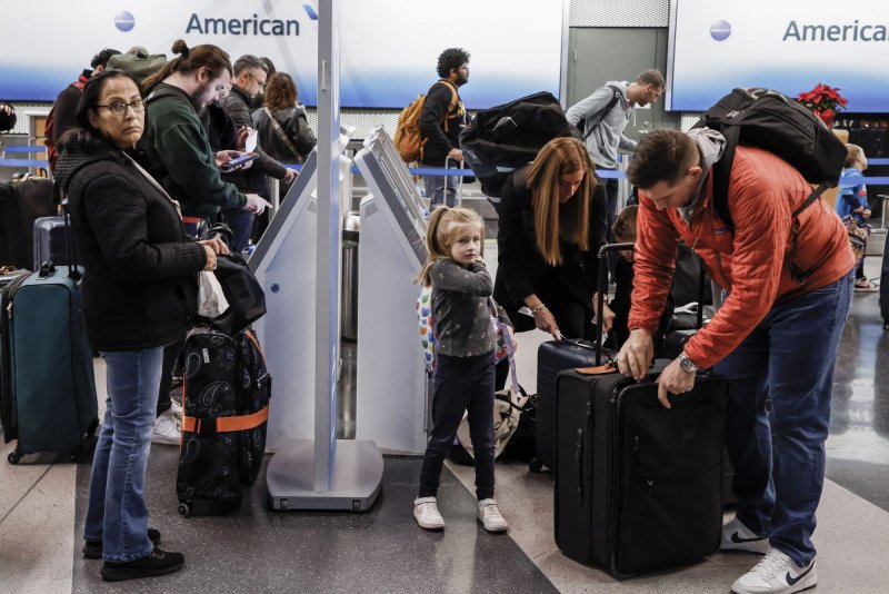 On Sunday, TSA reported the agency had its busiest day with more than three million traveling airline passengers screened at U.S. airports by TSA agents for the Thanksgiving holiday season. Photo by Tannen Maury/UPI