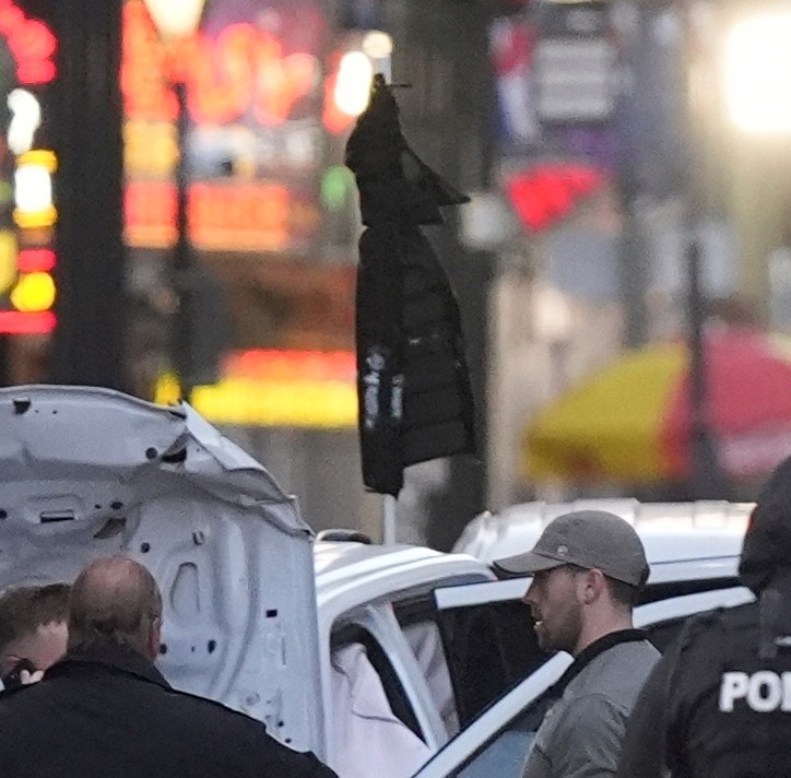 The flag on the back of the truck was covered by officials following the attack