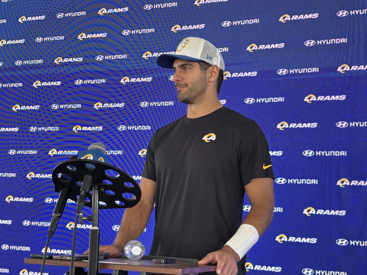 Rams backup quarterback Jimmy Garoppolo speaks to reporters during a news conference.