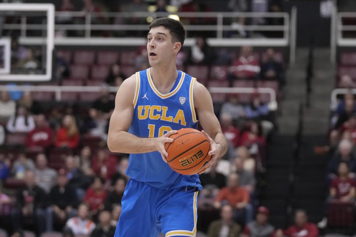 UCLA guard Lazar Stefanovic looks to pass the ball during a relatively quiet game at Stanford on Feb. 7.