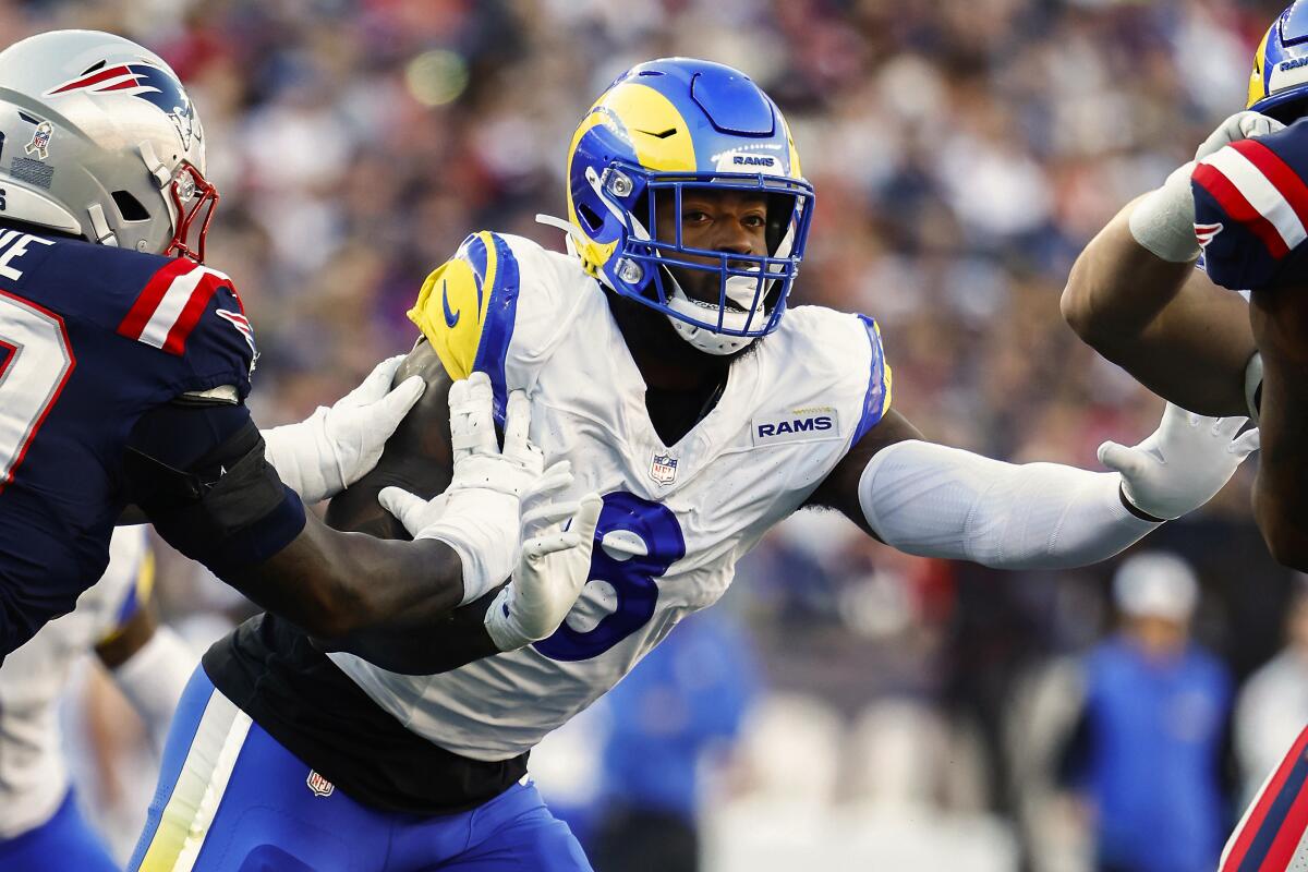 Rams edge rusher Jared Verse defends during a win over the New England Patriots on Nov. 17.