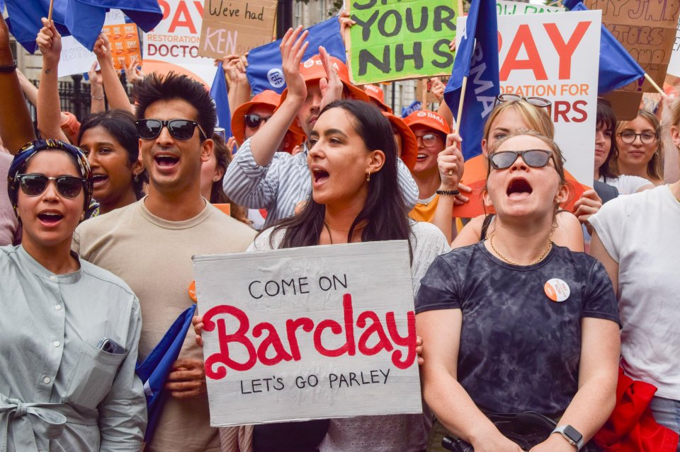 A doctor holds a message for former Health Secretary Steve Barclay