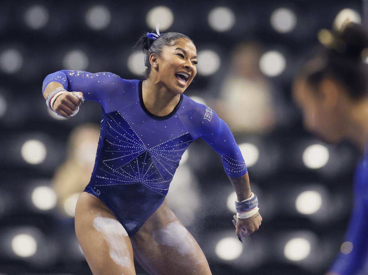 UCLA gymnast Jordan Chiles celebrates after her uneven bars routine on Saturday.