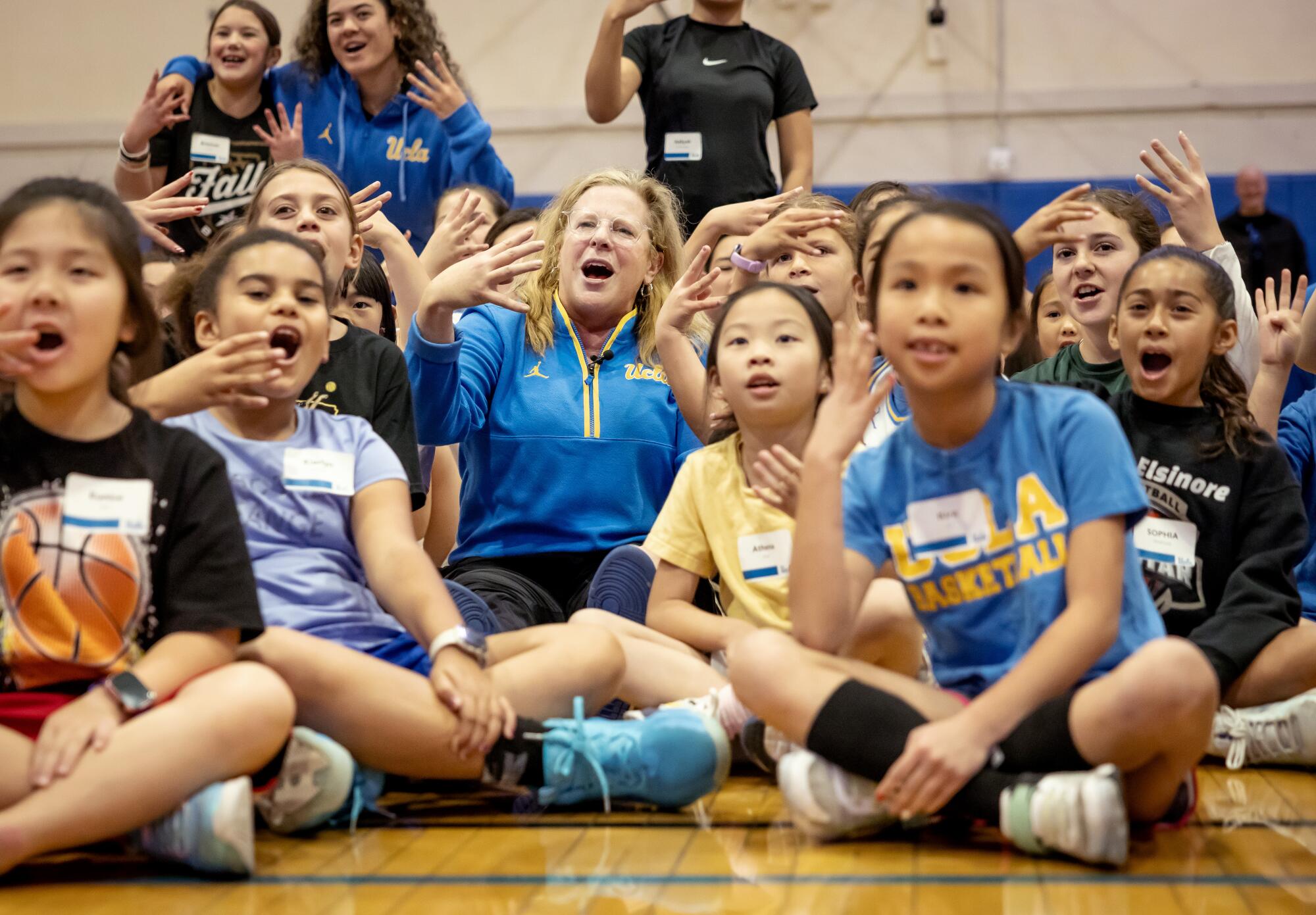 UCLA Women's Basketball Head Coach Cori Close coaches at a girls basketball clinic on campus.