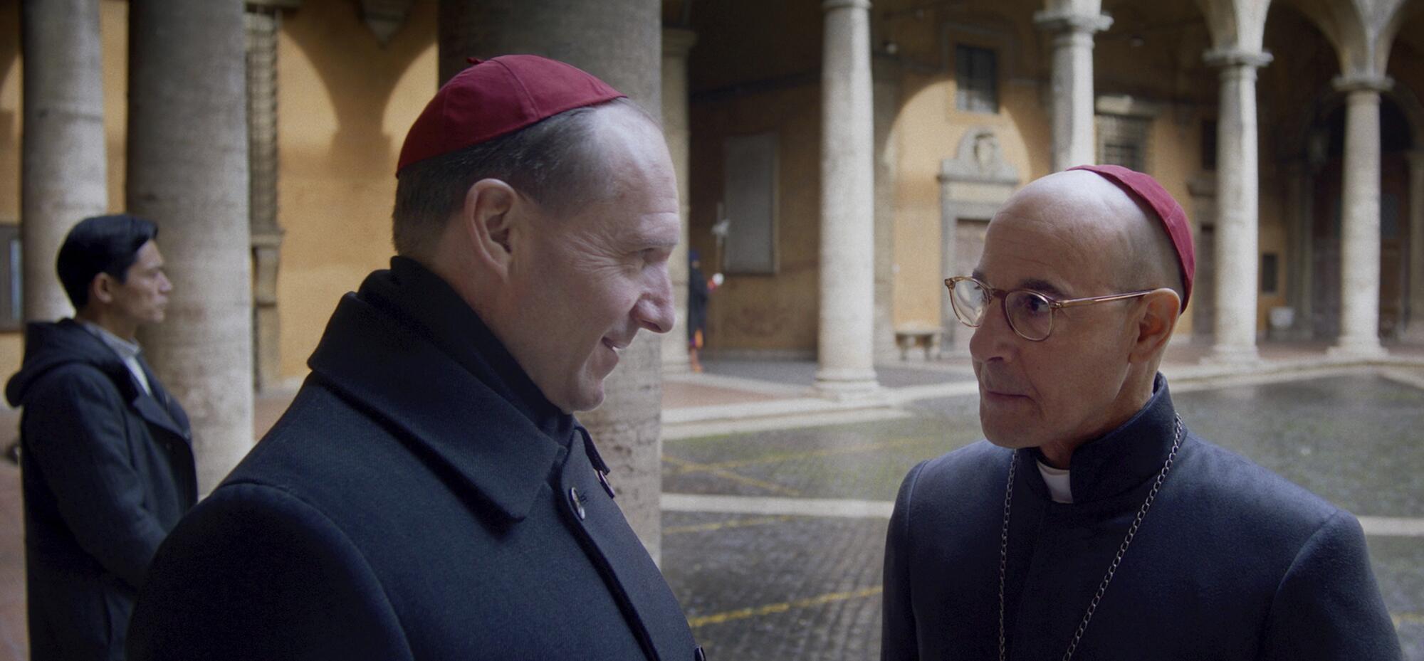 Ralph Fiennes and Stanley Tucci, right, in a scene from "Conclave." (Focus Features AP)