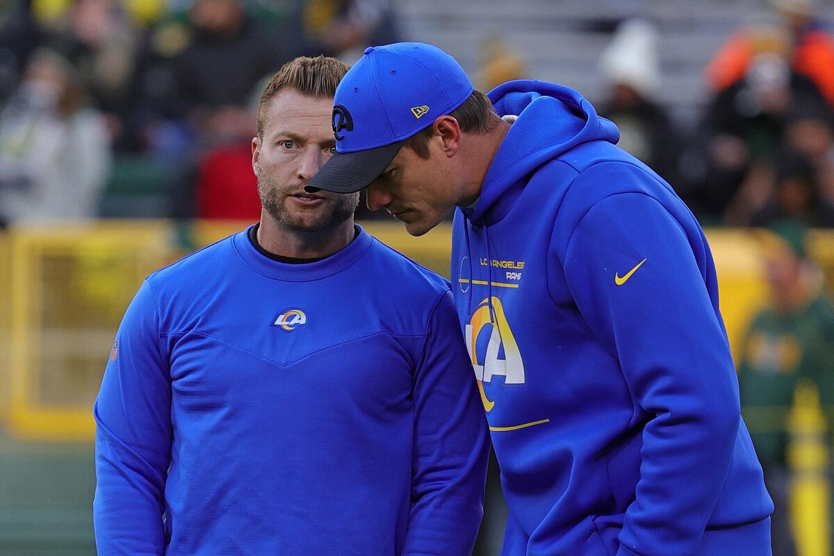 Rams coach Sean McVay, left, talks with offensive coordinator Kevin O'Connell in 2021.