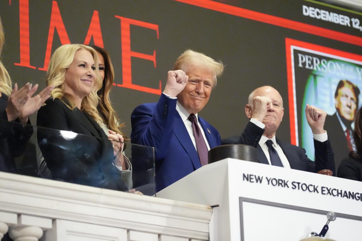 President-elect Donald Trump gestures after ringing the opening bell at the New York Stock Exchange on Dec. 12.