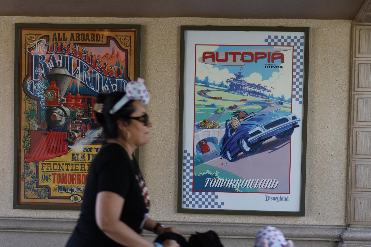 A sign for Autopia, powered by Honda, near the entrance to Disneyland.