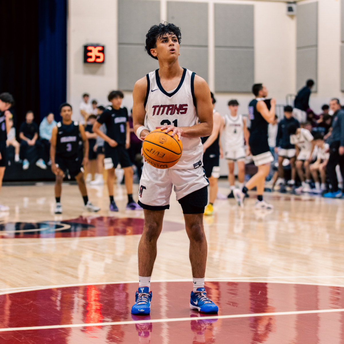 Isaiah Bennett of AGBU looks toward the basket as he prepares to take a free throw.