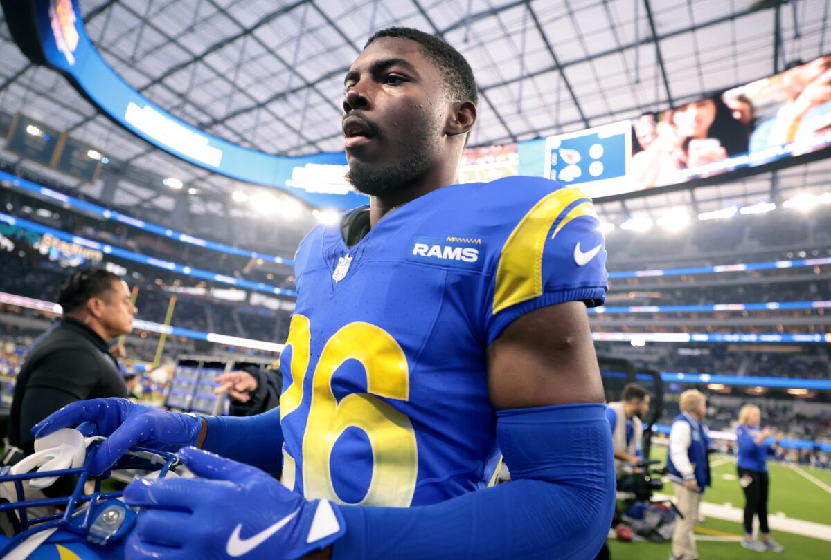 Rams cornerback Kamren Kinchens comes off the field after warming-up at SoFi Stadium in December.