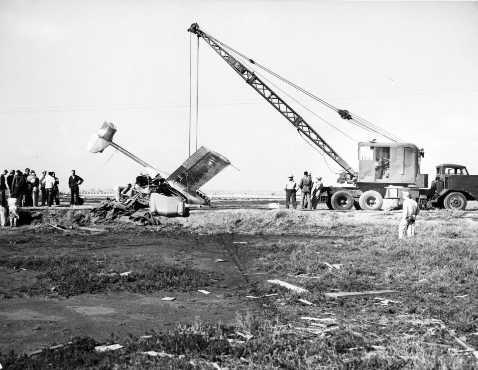 A wrecked Convair Model 118 ConvAirCar being salvaged with a crane.