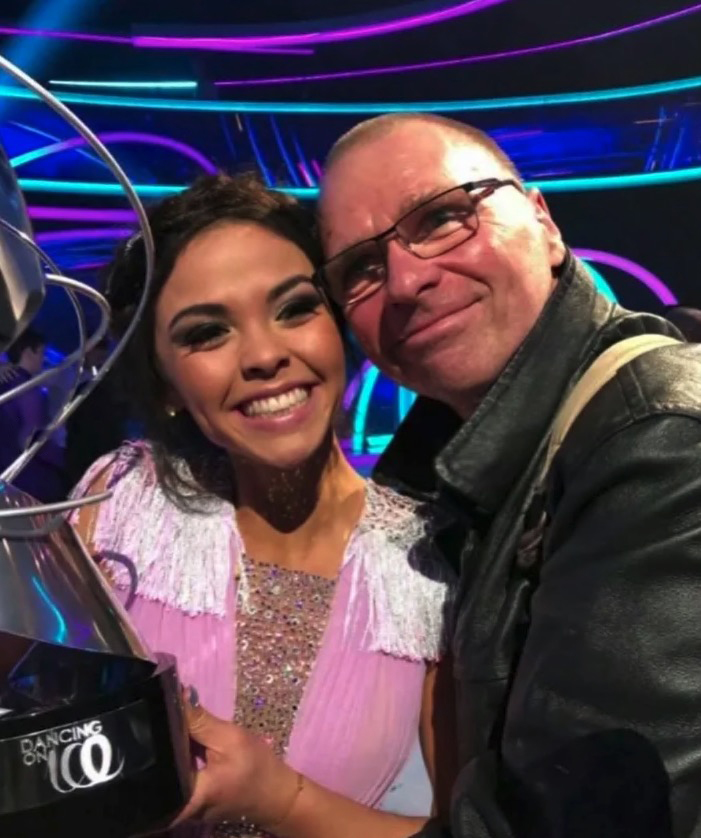 Vanessa Bauer with her father holding a Dancing on Ice trophy.