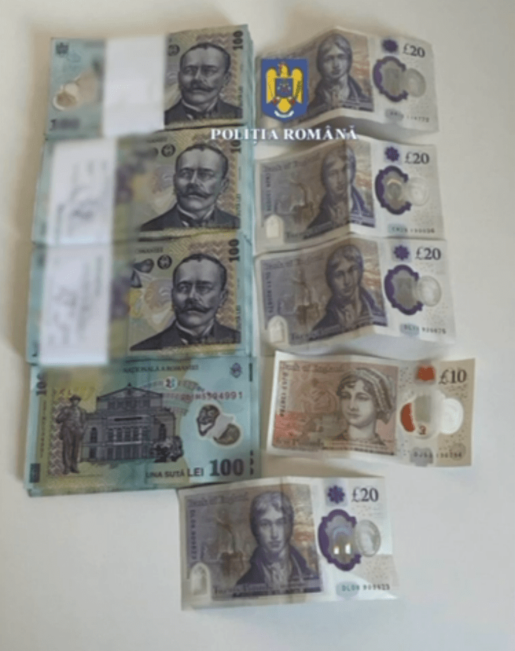 Stacks of Romanian Leu and British Pound banknotes.