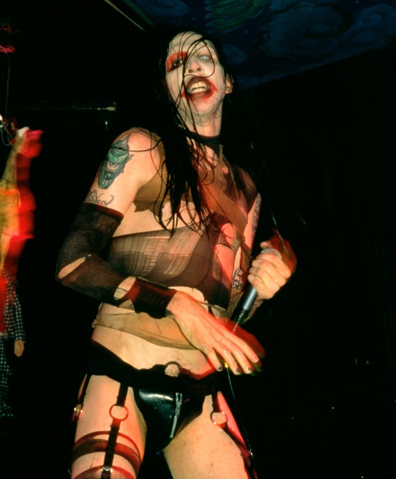 Marilyn Manson performing on stage.