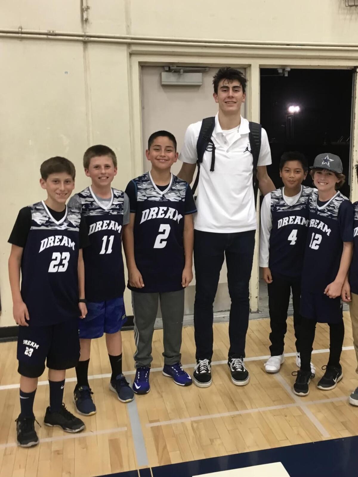 In 2018, members of this year's Camarillo basketball team took a photo with Jaime Jaquez Jr. 