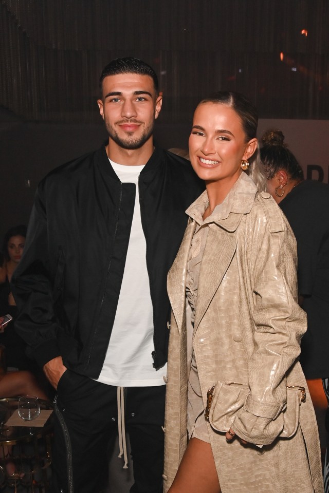 Tommy Fury and Molly-Mae Hague at a fashion show.