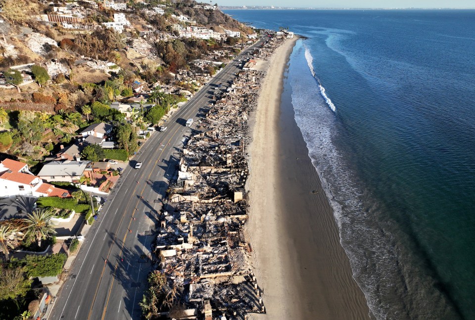 Aerial view of beachfront homes destroyed by fire.