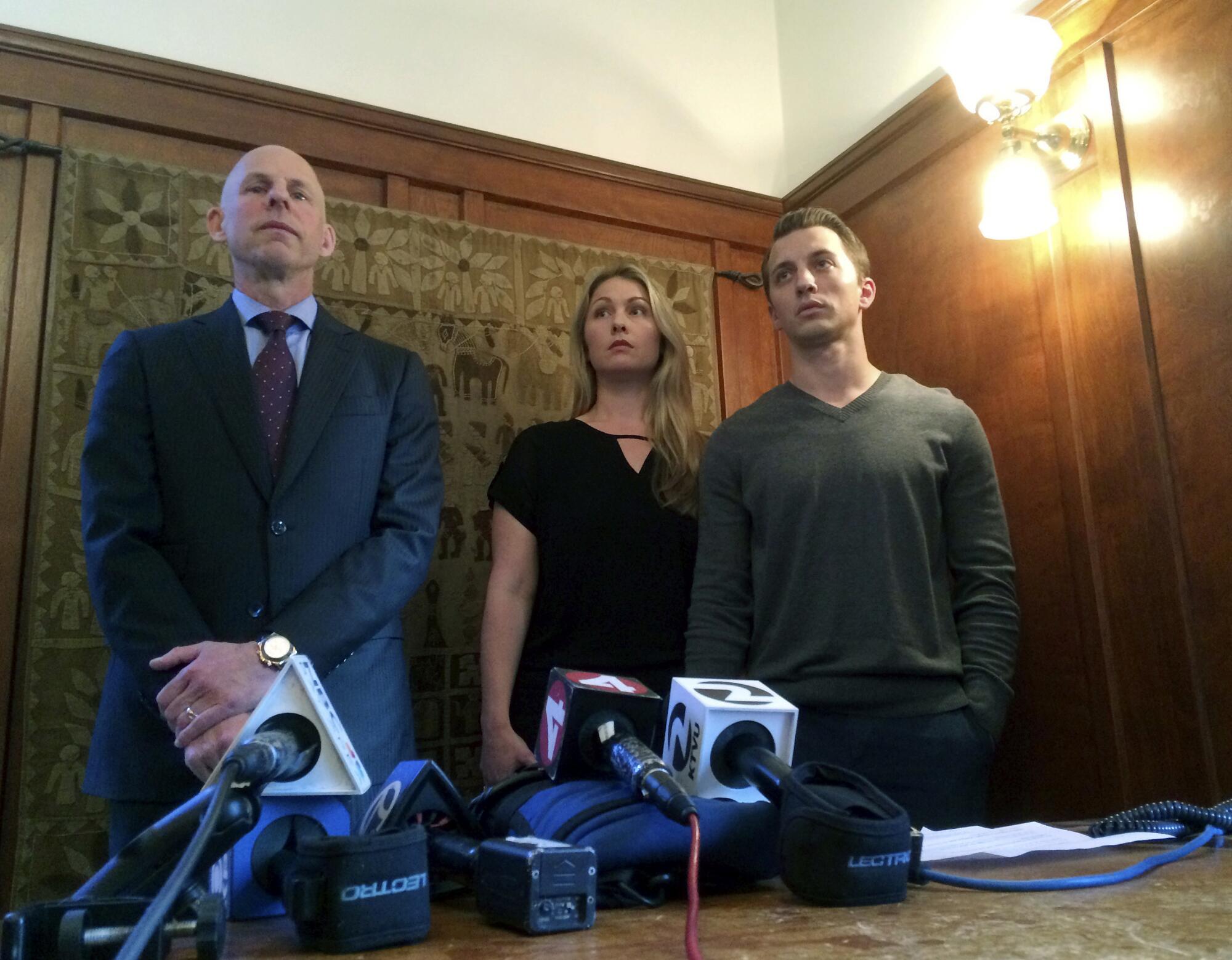 Attorney Anthony Douglas Rappaport at a 2016 news conference with clients Denise Huskins and Aaron Quinn. 