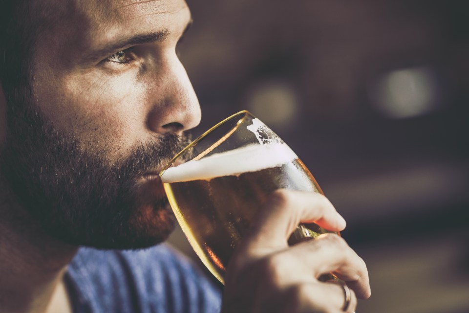 Man drinking beer.