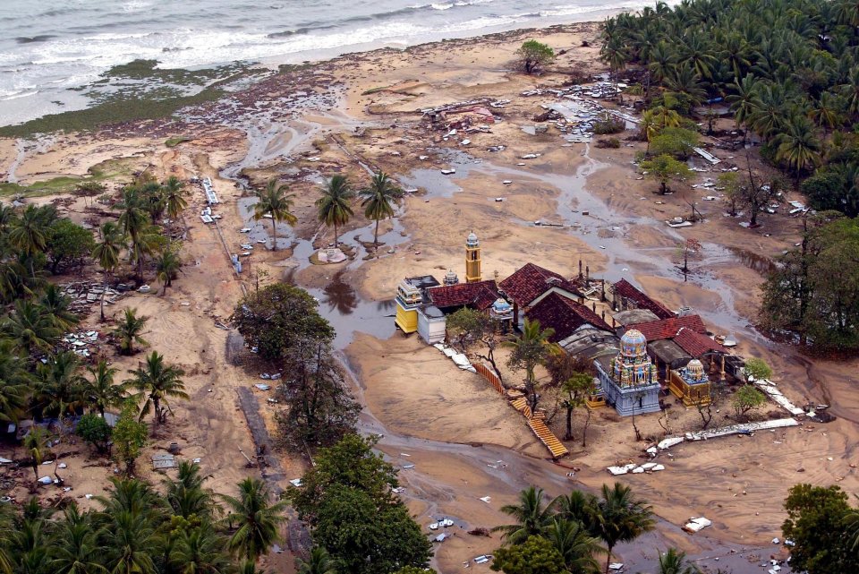 Aerial view of flood damage to a religious building in Sri Lanka.