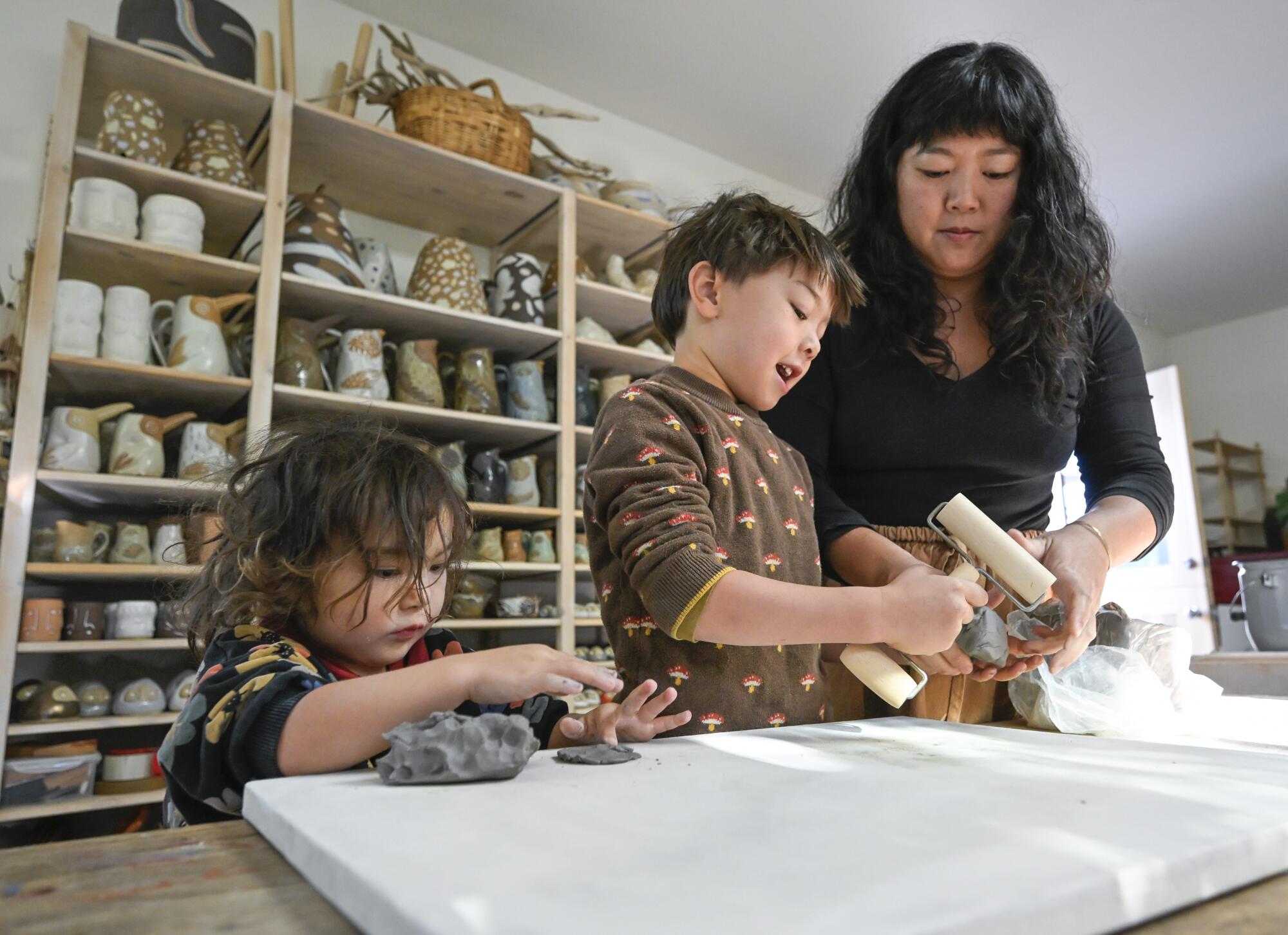 Ceramist Linda Hsiao with her children Wawona Hsiao, 3, and Saben Taylor, 5. 