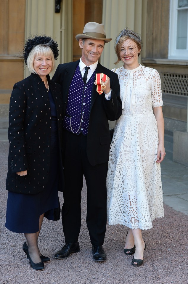 Sir Mark Rylance with his wife and daughter at Buckingham Palace after being knighted.