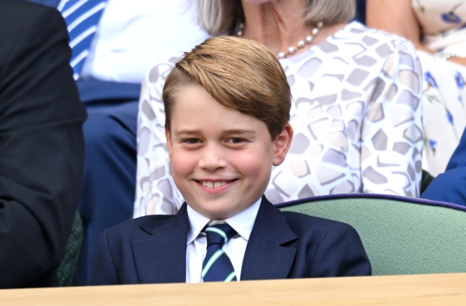 Prince George of Cambridge smiling at Wimbledon.