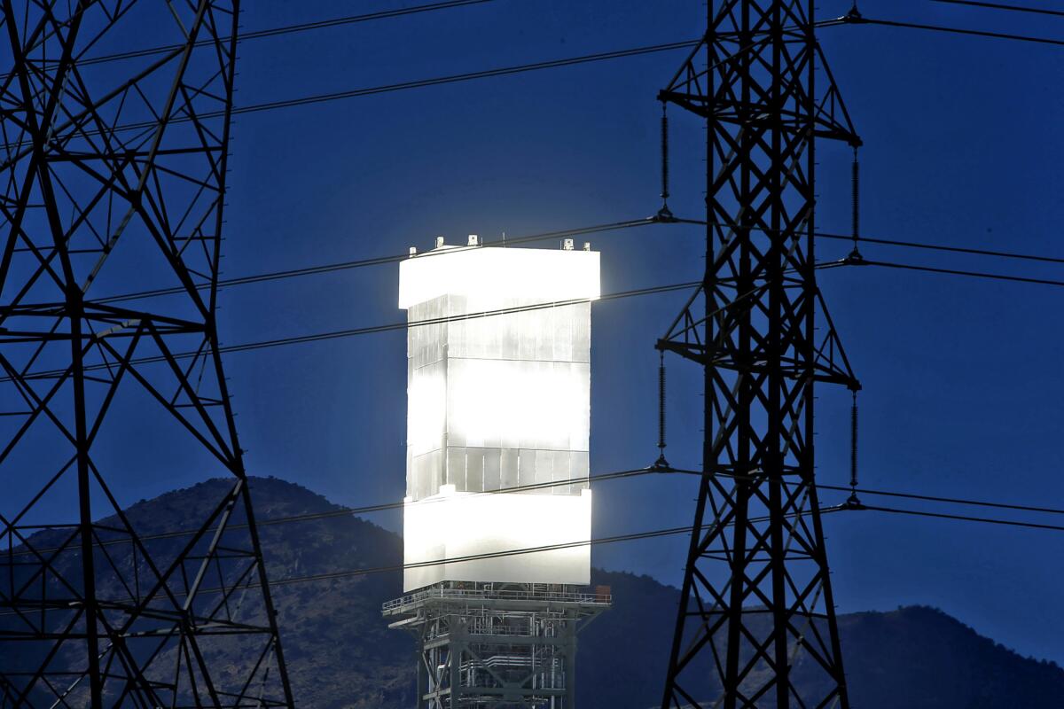 A tower is glowing hot at the Ivanpah solar plant.