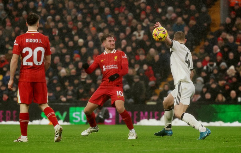 Soccer Football - Premier League - Liverpool v Manchester United - Anfield, Liverpool, Britain - January 5, 2025 Manchester United's Matthijs de Ligt concedes a penalty REUTERS/Phil Noble EDITORIAL USE ONLY. NO USE WITH UNAUTHORIZED AUDIO, VIDEO, DATA, FIXTURE LISTS, CLUB/LEAGUE LOGOS OR 'LIVE' SERVICES. ONLINE IN-MATCH USE LIMITED TO 120 IMAGES, NO VIDEO EMULATION. NO USE IN BETTING, GAMES OR SINGLE CLUB/LEAGUE/PLAYER PUBLICATIONS. PLEASE CONTACT YOUR ACCOUNT REPRESENTATIVE FOR FURTHER DETAILS..