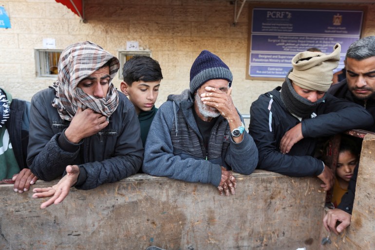 People mourn Palestinians killed in Israeli strikes