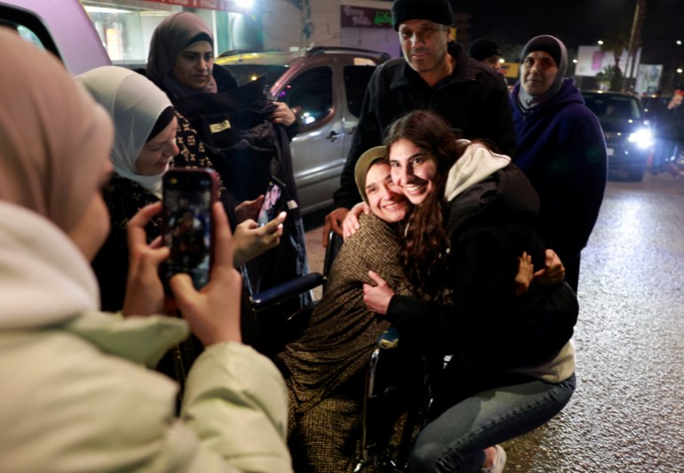 A freed Palestinian prisoner poses for a photo after being released from an Israeli jail as part of a hostages-prisoners swap and a ceasefire deal in Gaza between Hamas and Israel, in Ramallah, in the Israeli-occupied West Bank, January 20, 2025. REUTERS/Ammar Awad