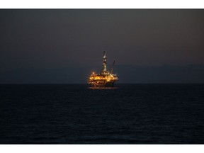 HUNTINGTON BEACH, CA - APRIL 20: An offshore oil platform is seen in the Pacific Ocean amidst the coronavirus pandemic on April 20, 2020 in Huntington Beach, California. Oil prices traded in negative territory for the first time as the spread of COVID-19 impacts global demand.