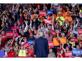 Trump supporters at the closing rally of his 2024 presidential campaign in Grand Rapids, Michigan.