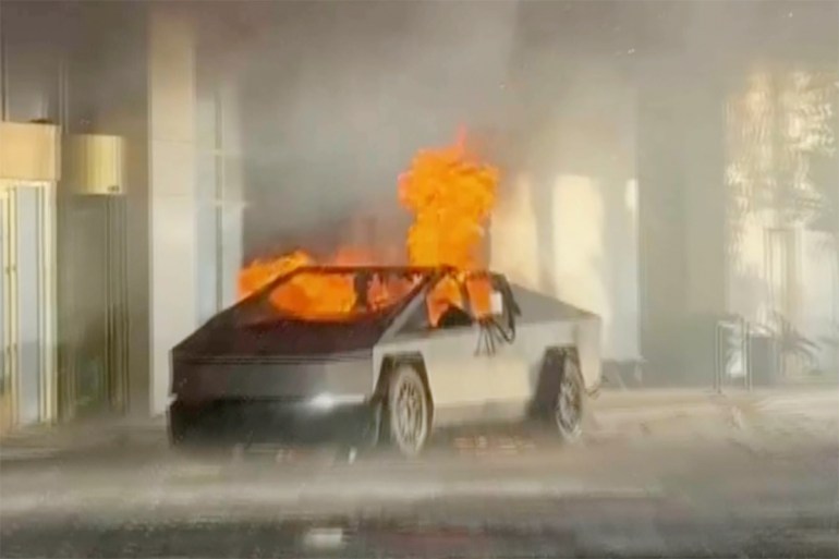 A Tesla Cybertruck burning outside the Trump hotel in Las Vegas