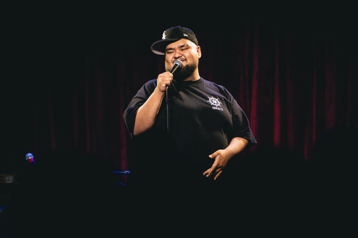 Flores performing on the Lab stage at the Hollywood Improv.