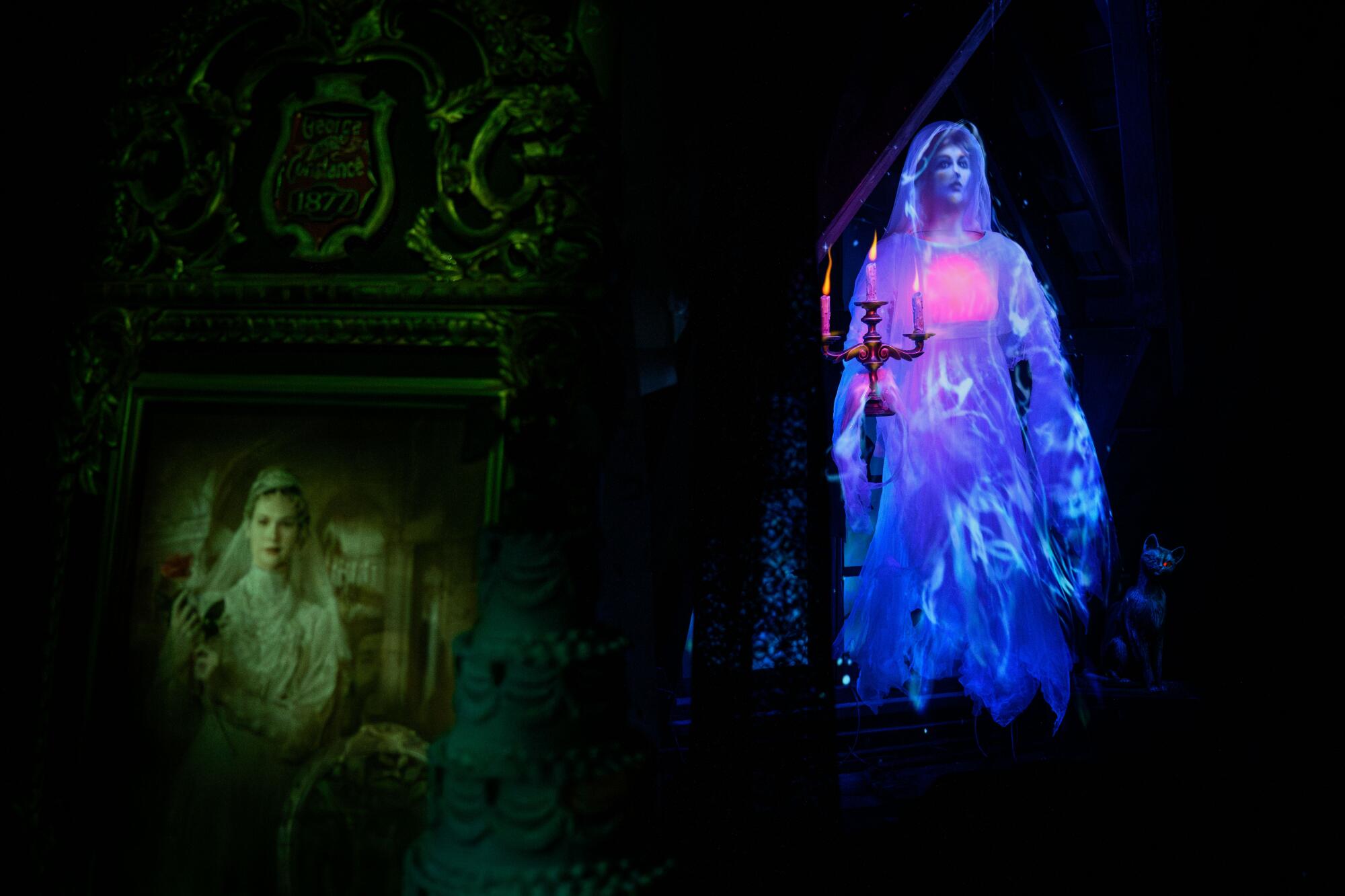 The new Haunted Mansion bride figure is ghostly white and appears to hover. 