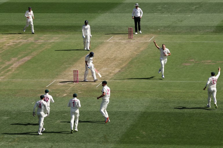 SYDNEY, AUSTRALIA - JANUARY 04: Scott Boland of Australia celebrates the wicket of Virat Kohli of India during day two of the Fifth Men's Test Match in the series between Australia and India at Sydney Cricket Ground on January 04, 2025 in Sydney, Australia. (Photo by Darrian Traynor/Getty Images)