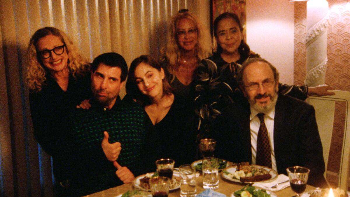 A family poses for a photograph.