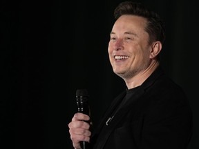 FILE - Elon Musk speaks as part of a campaign town hall in support of Republican presidential nominee former President Donald Trump in Folsom, Pa., Thursday, Oct. 17, 2024.