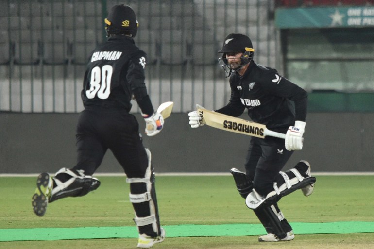 epa11901965 New Zealand Mark Chapman (R) and Devon Conway run between the wickets during a warm up match ahead of the ICC men's champions trophy in Karachi, Pakistan, 16 February 2025. EPA-EFE/SHAHZAIB AKBER