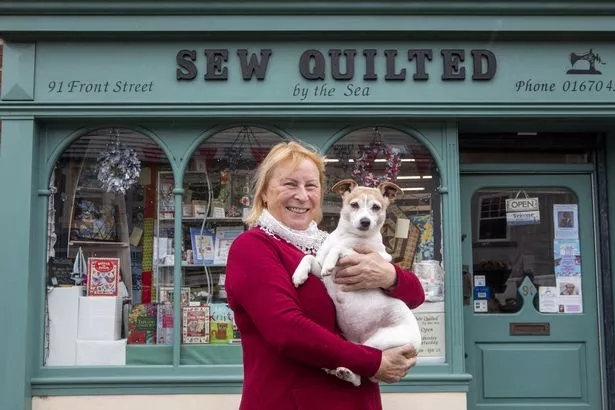 Hazel Steel with Lucie the Jack Russell,
Newbiggin-by-the-sea voted Britain's cheapest seaside town.