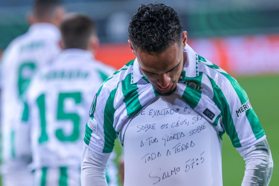 Real Betis player Antony celebrates, a message written on his shirt.