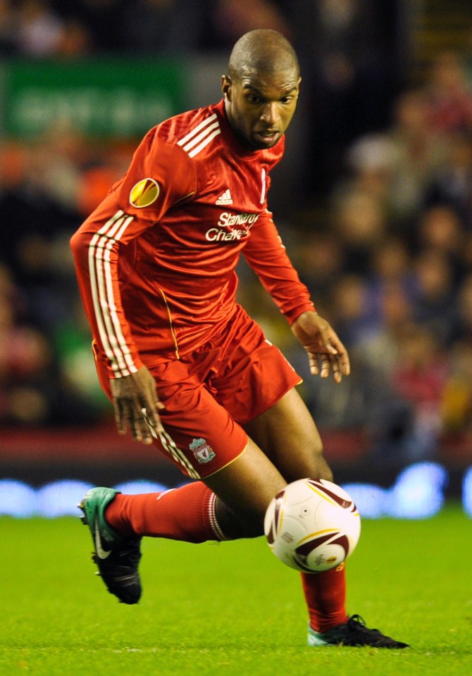 Ryan Babel, Liverpool soccer player, dribbling the ball.