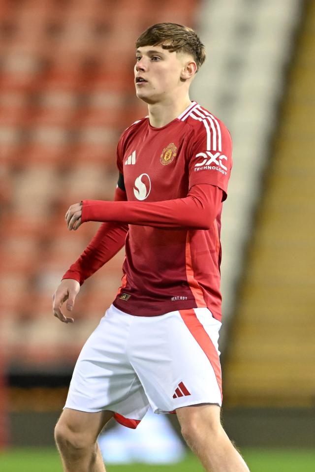 Manchester United midfielder Jack Moorhouse playing in a soccer match.