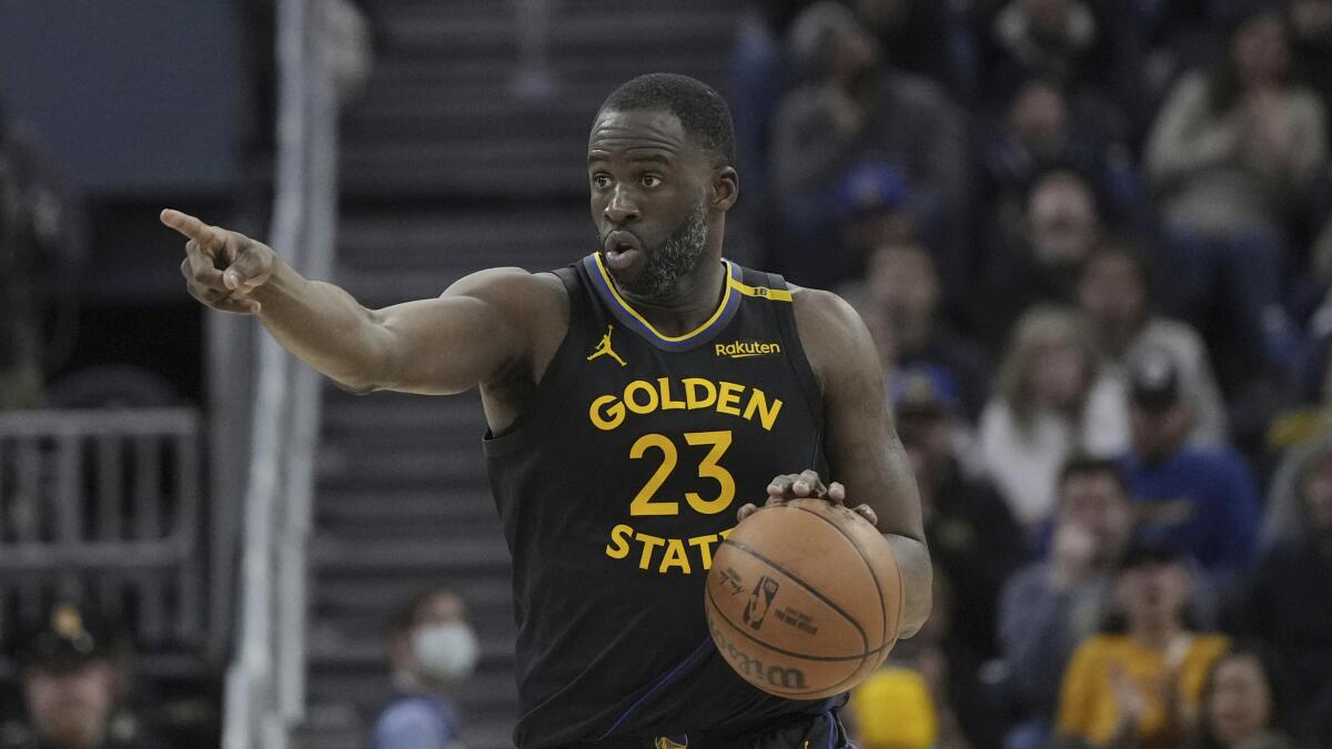 Golden State Warriors forward Draymond Green gestures during a game against the Orlando Magic on Feb. 3.