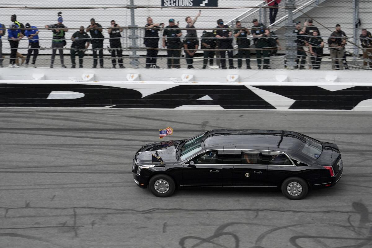 President Trump's limousine drives on the Daytona 500 course.