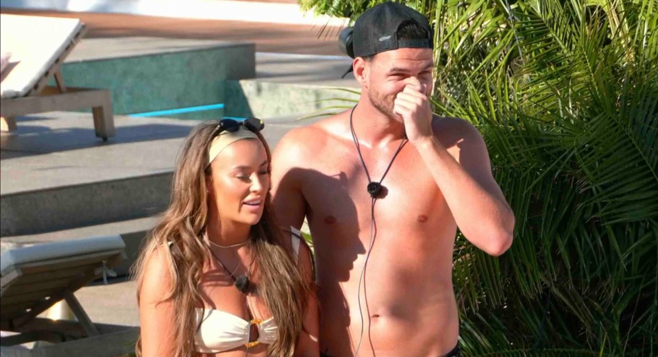 Screenshot of a man and woman by a pool, from Love Island.